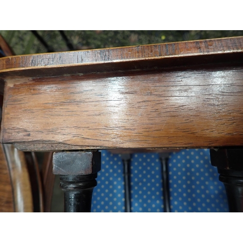 585 - A 19th Century Nest of three rosewood and satinwood strung Occasional Tables with rounded corners mo... 