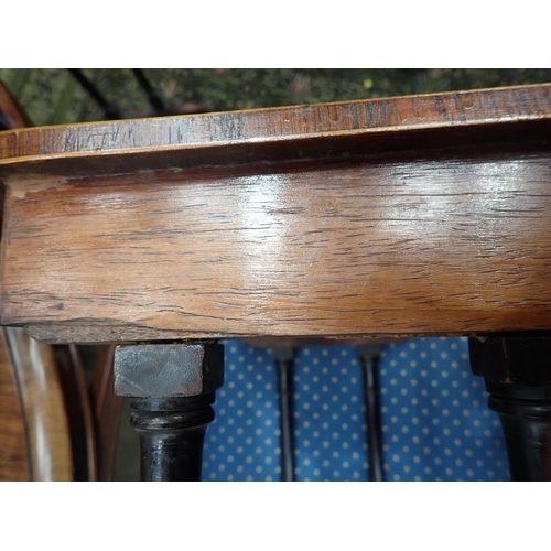 585 - A 19th Century Nest of three rosewood and satinwood strung Occasional Tables with rounded corners mo... 