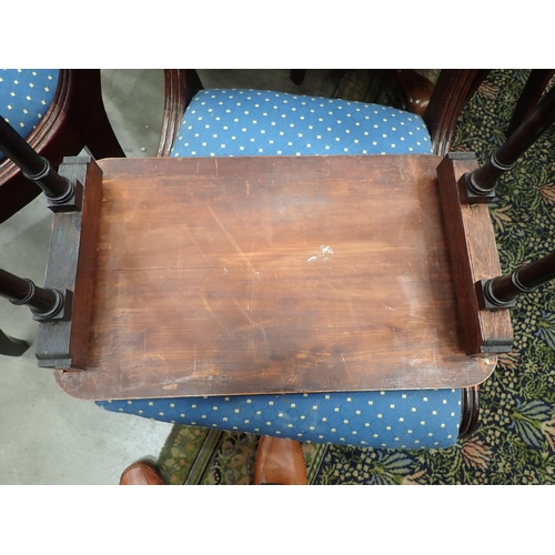 585 - A 19th Century Nest of three rosewood and satinwood strung Occasional Tables with rounded corners mo... 