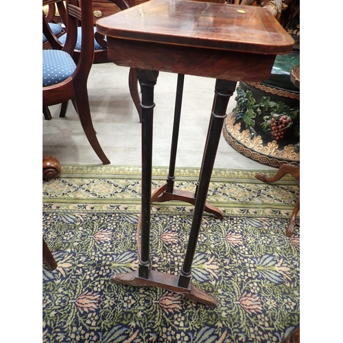 585 - A 19th Century Nest of three rosewood and satinwood strung Occasional Tables with rounded corners mo... 