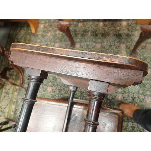 585 - A 19th Century Nest of three rosewood and satinwood strung Occasional Tables with rounded corners mo... 