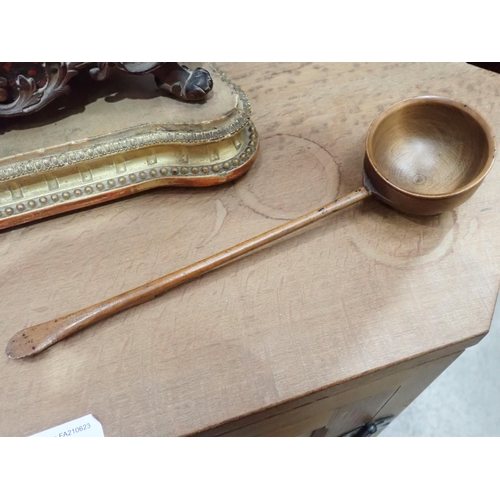 452 - A Collection of treen and other items including a Ladle, an Egg Cup, Pastry Cutters, a Corkscrew wit... 