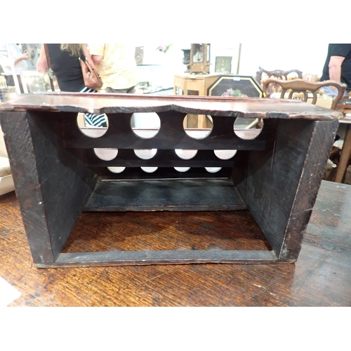 477 - An 18th Century Welsh oak Spoon Rack with raised shaped top, three tiers, cupids bow cut out design ... 