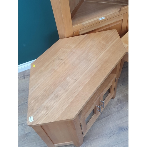 10 - A light oak Standing glazed Corner Cupboard with panel cupboard door to the bottom, H6ft 7