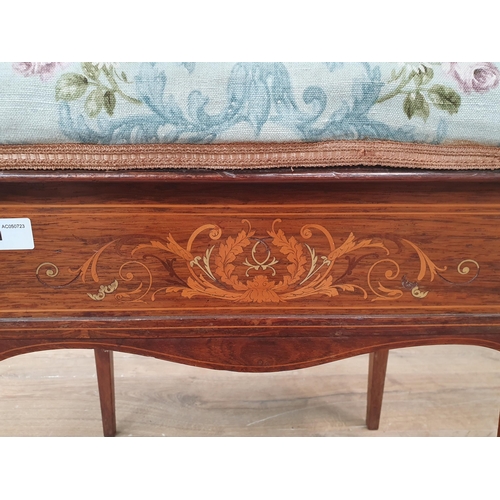 11 - An Edwardian Rosewood inlaid Piano Stool with floral upholstered top on tapered supports with brass ... 