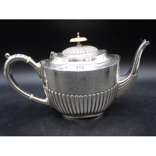 112 - An Edward VII silver three piece Tea Service of oval shape semi-fluted form having engraved frieze B... 