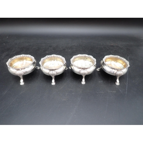 116 - A set of four Victorian silver cauldron Salts with shaped rims on hoof feet, London 1898  335gms