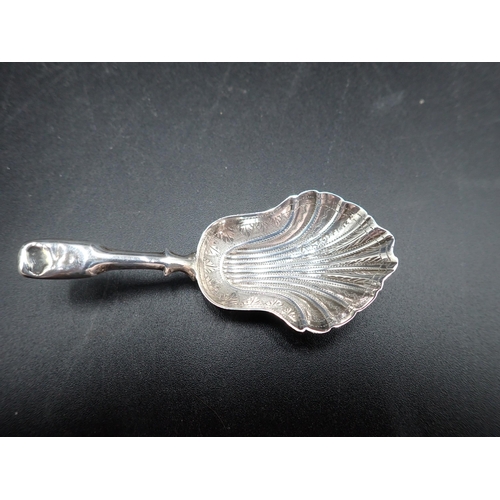 118 - A Victorian silver Caddy Spoon fiddle pattern with finely engraved scallop Bowl, Birmingham 1864 mak... 