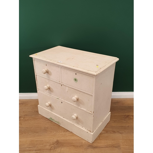 12 - A white painted pine Chest of two short and two long Drawers on plinth base, 2ft 7