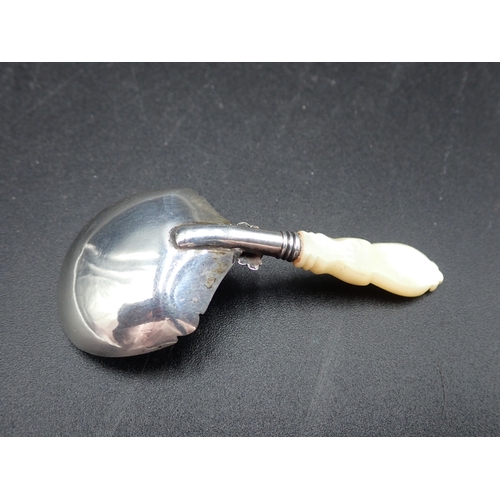 124 - A Victorian silver Caddy Spoon with mother of peal handle, Birmingham 1868  maker George Unite