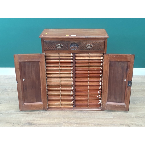 14 - A hardwood Coin Collectors Cabinet fitted with 82 slides with various coin sizes and single drawer t... 