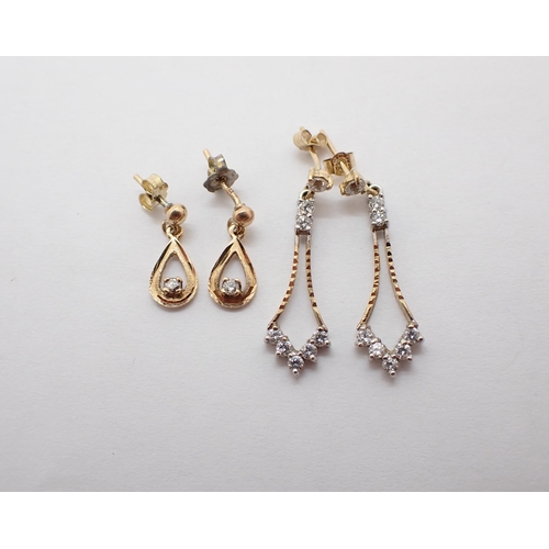 173 - A pair of 9ct gold Drop Earrings each claw-set single brilliant-cut diamond and a pair of Drop Earri... 