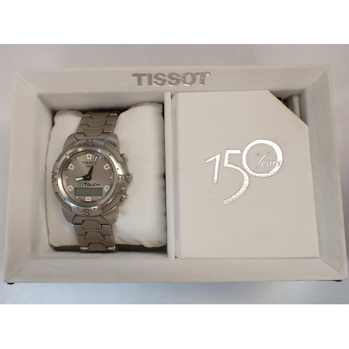 175 - A gentleman's Tissot Touch Wristwatch the brushed steel dial with dot markers in stainless steel cas... 