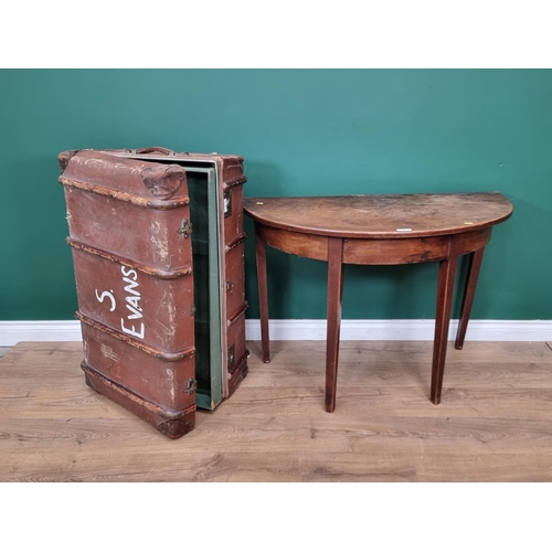 19 - A 19th Century mahogany demi-lune Side Table on squared supports and a vintage Luggage Case.