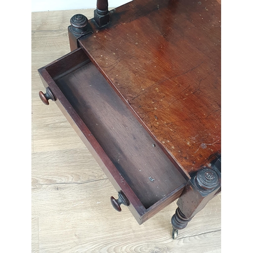 22 - A mahogany three tier Trolley on casters fitted single drawer to base H3ft 9