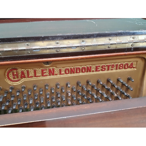 27 - A Mahogany Upright Piano by Challen.