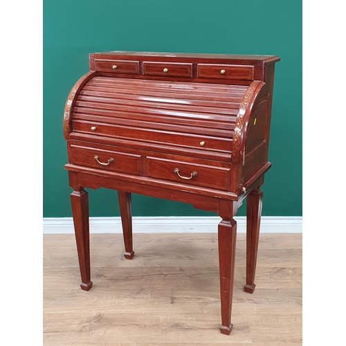 29 - A reproduction French style inlaid roll top Desk/Bureau supported on tapered feet.