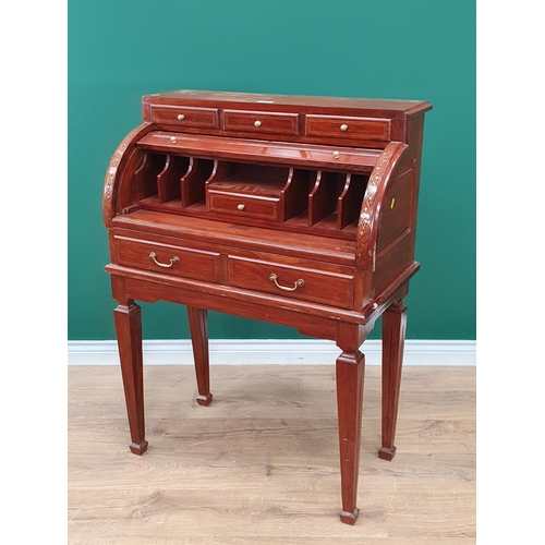 29 - A reproduction French style inlaid roll top Desk/Bureau supported on tapered feet.