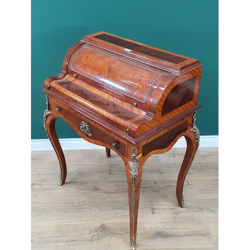 30 - A reproduction French style crossbanded and inlaid roll top Desk/Bureau with fold out leather writin... 