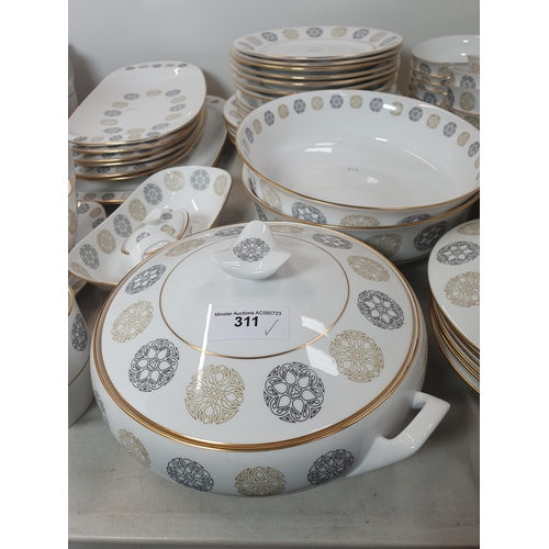 311 - A Spode bone china Dinner, Tea and Coffee Service, 'Gothic' pattern, viz: Numerous Plates, Dishes, B... 