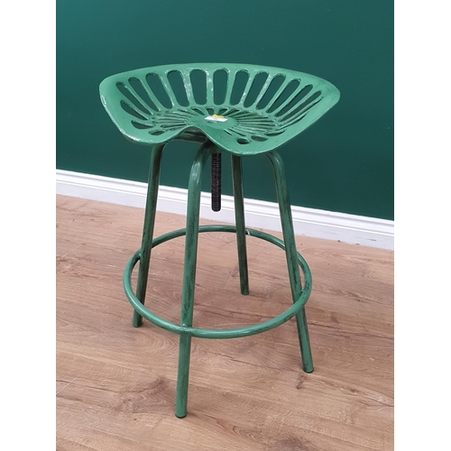 32 - A green painted metal Tractor Seat breakfast Bar Stool.