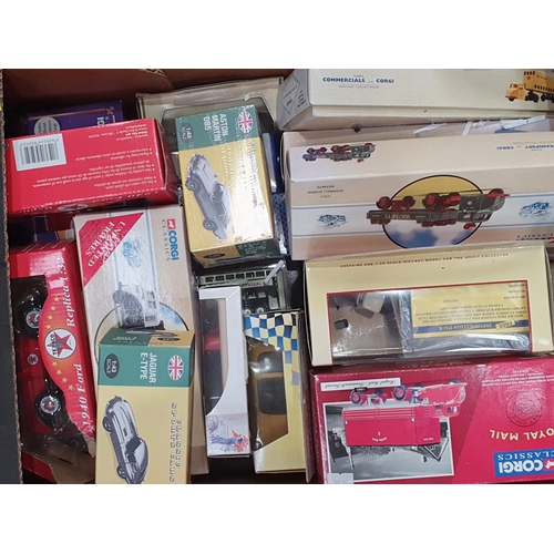 329 - Two boxes of boxed models, including Corgi