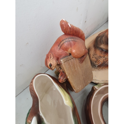 364 - A quantity of pottery items including Fauna ware Jugs, a Hornsea Bowl with lamb, Bossons Figures etc