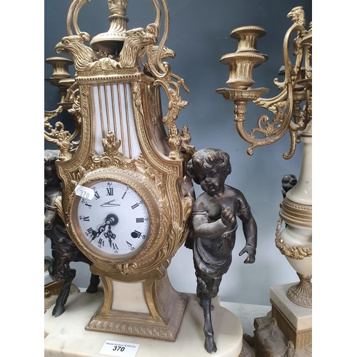 370 - A French style gilt and marble three piece Clock Garniture, the clock with lyre design flanked by ch... 