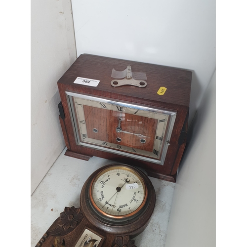 382 - An Art Deco oak Mantel Clock, an oak aneroid Barometer/Thermometer, a Compass on gimbol in case and ... 