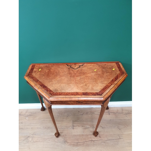 41 - An Edwardian style Side Table with crossbanded and inlaid top with claw and ball feet.