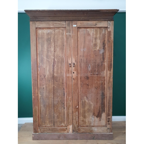 44 - A large painted Pine Wardrobe the interior fitted drawers and slides, 6ft 8in H x 4ft 7in W.