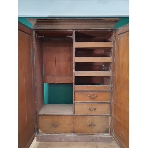 44 - A large painted Pine Wardrobe the interior fitted drawers and slides, 6ft 8in H x 4ft 7in W.