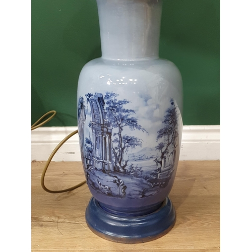 490 - A pair of blue porcelain table lamps with countryside landscape on the sides (Passed PAT Tests)