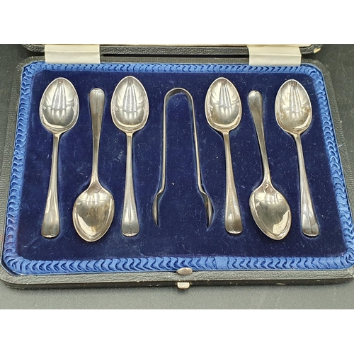 56 - Six George V silver Teaspoons and Sugar Tongs with rat tail bowls, Sheffield 1918, in case