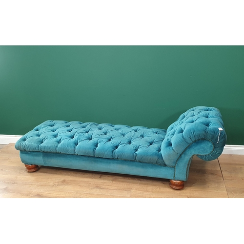 575 - A 19th Century turquoise button upholstered Chaise Lounge on squat turned supports 6ft 2in L x 1ft 1... 