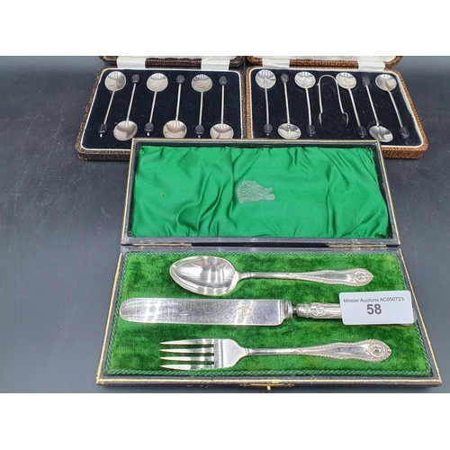 58 - Two Sets of six silver bean-handled Coffee Spoons, one with tongs, Birmingham 1924 and 1931, and a t... 