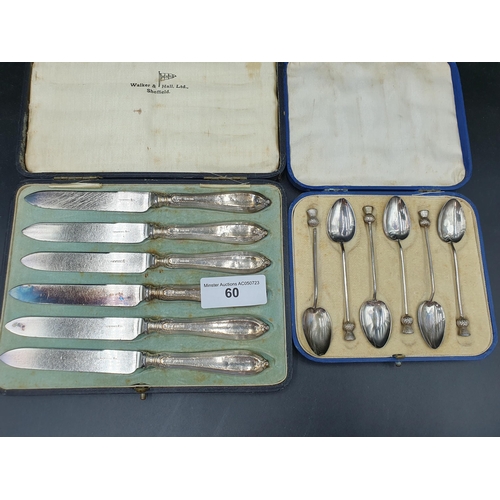 60 - Six George V silver and enamel Coffee Spoons with thistle finials, Birmingham 1929, A/F, in case, an... 