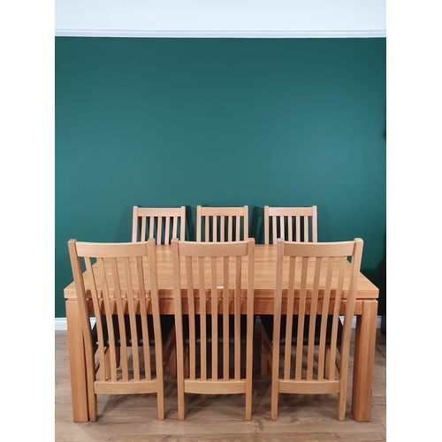 603 - A modern oak Kitchen Table 5ft 3in L x 2ft 6in H and six Chairs