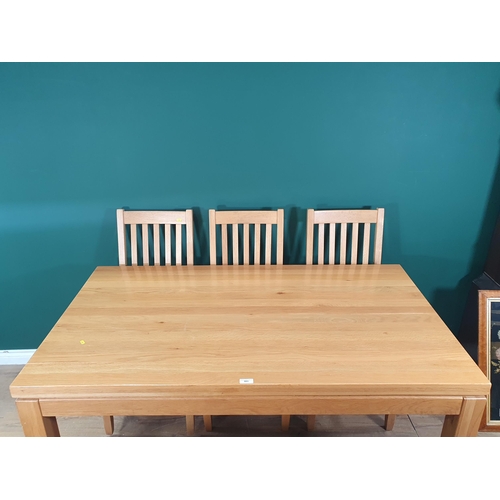 603 - A modern oak Kitchen Table 5ft 3in L x 2ft 6in H and six Chairs