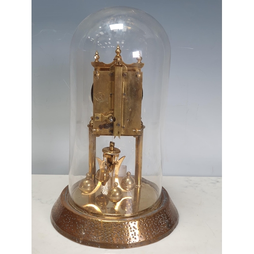 615 - A brass Mantle Clock under glass dome 1ft H