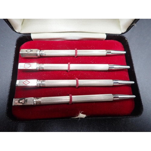 63 - Four sterling silver Bridge Pencils, in case