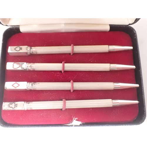 63 - Four sterling silver Bridge Pencils, in case