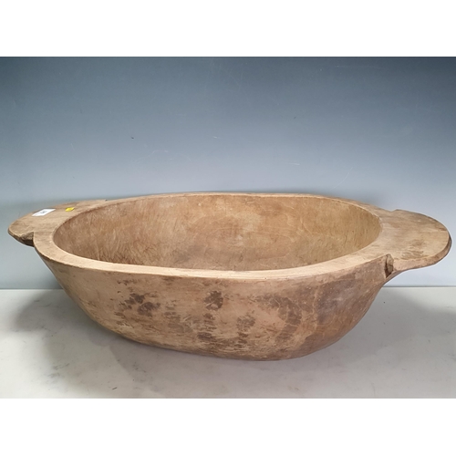 645 - A large 19th Century sycamore Dairy Bowl, 2ft 2in L x 8in H