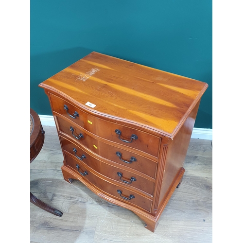 648 - A yew veneered serpentine fronted Chest of four drawers 2ft 7in H x 2ft 3in W and a reproduction mah... 