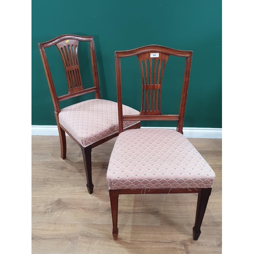 656 - A pair of walnut pierced splat back Dining Chairs