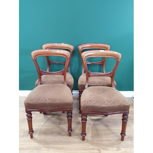 663 - A set of four Victorian walnut balloon back Dining Chairs with brown upholstered seats by T.Wallis &... 