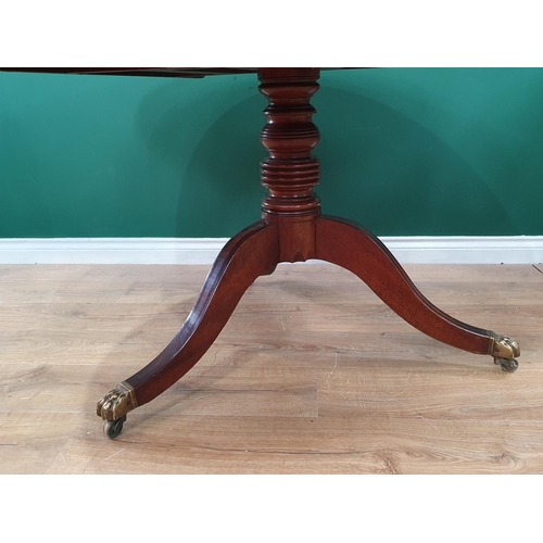 668 - A 19th Century mahogany and rosewood crossbanded circular Breakfast Table on turned column and out s... 