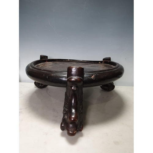 737 - A Chinese hardwood circular Stand on paw feet,  15in Diam