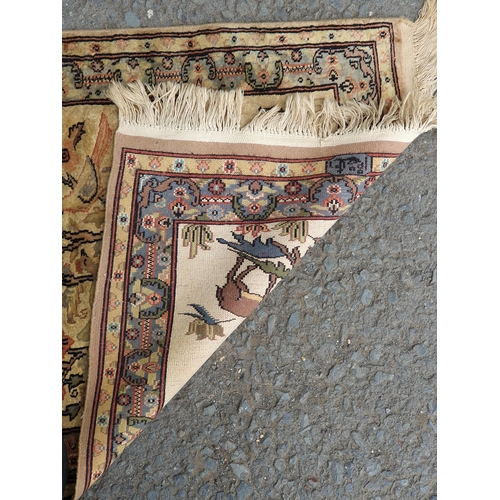 741 - A small Persian Rug on a brown ground, 5ft 8in x 4ft 2in and a small cotton Rug depicting deer besid... 