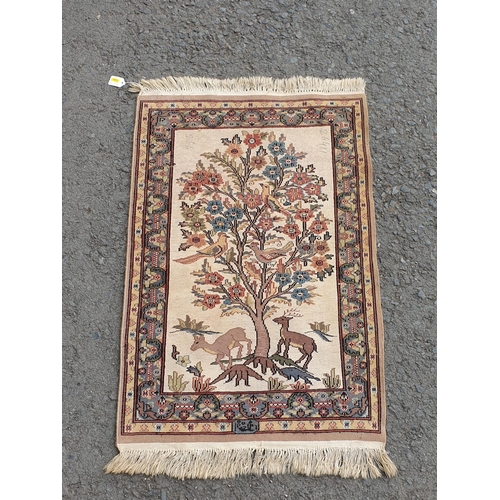 741 - A small Persian Rug on a brown ground, 5ft 8in x 4ft 2in and a small cotton Rug depicting deer besid... 